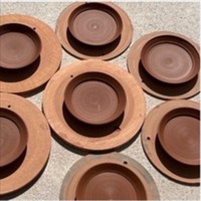 Nested ceramic bread and dinner plates